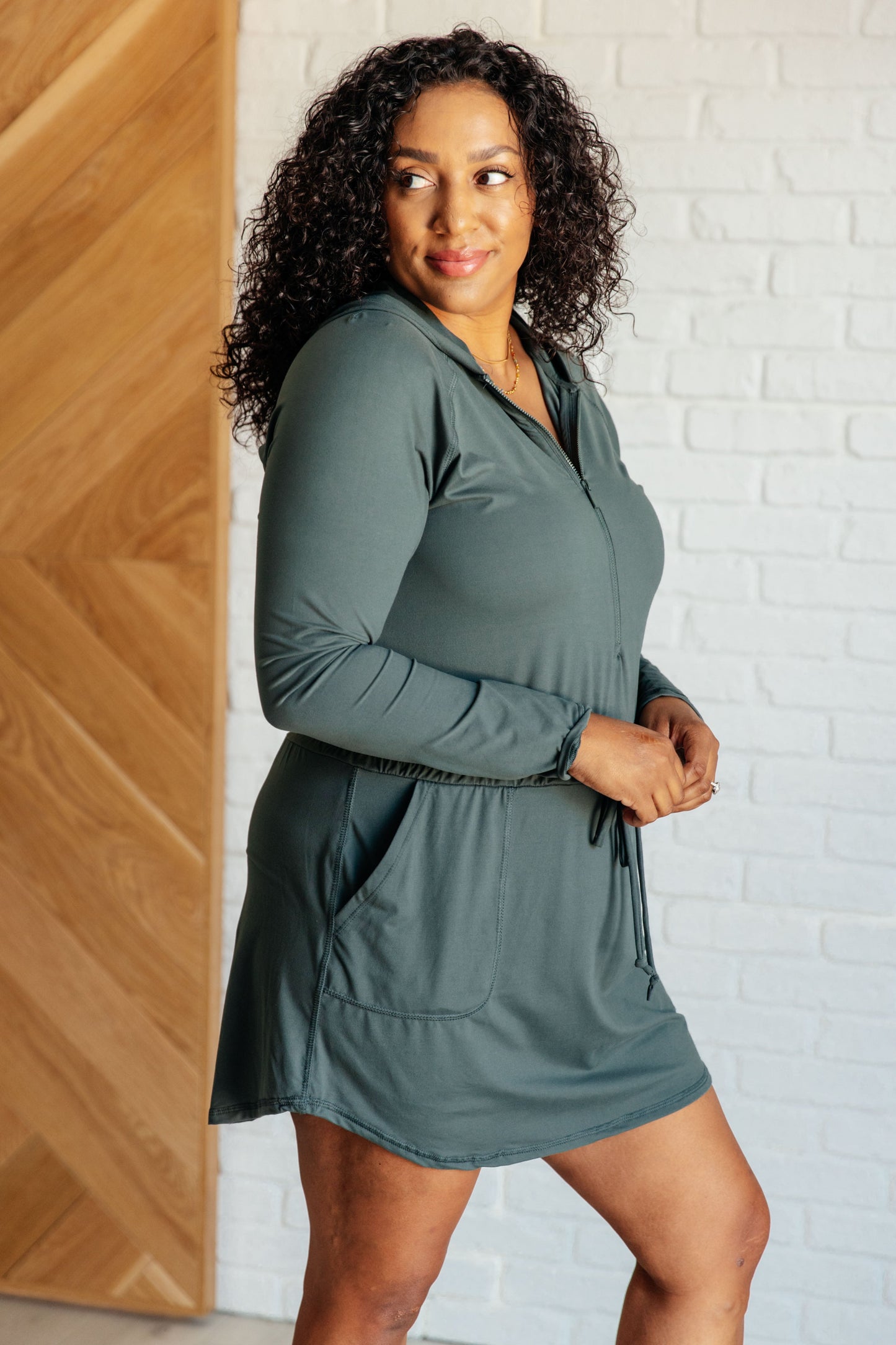 Getting Out Long Sleeve Athletic Romper in Smoked Spruce